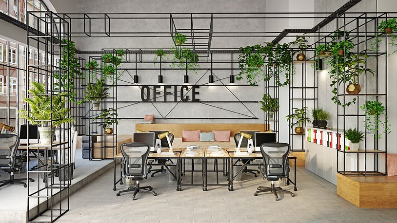 Modern office with black frames, plants, and open desks. "OFFICE" sign on wall. Gray, brown, and green tones create a fresh atmosphere.