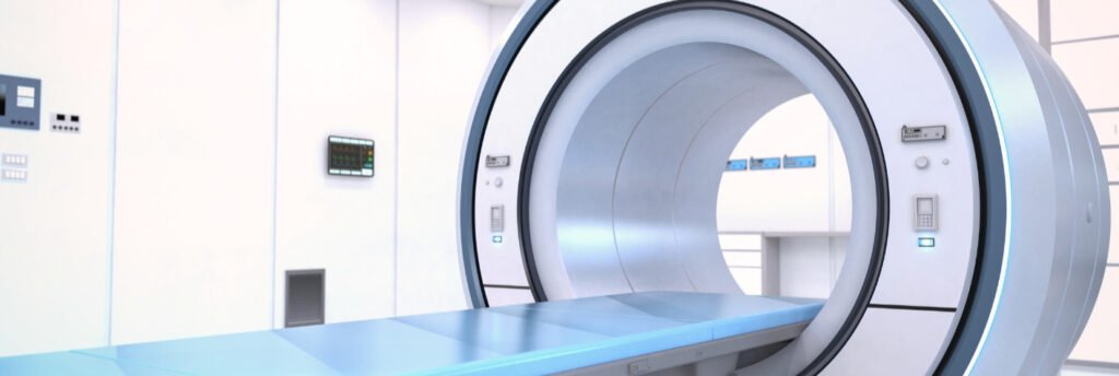 CT scanner sits in a white room with light blue lighting