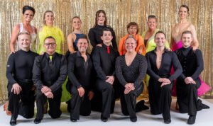 Dance troupe group photo: diverse dancers in formal wear