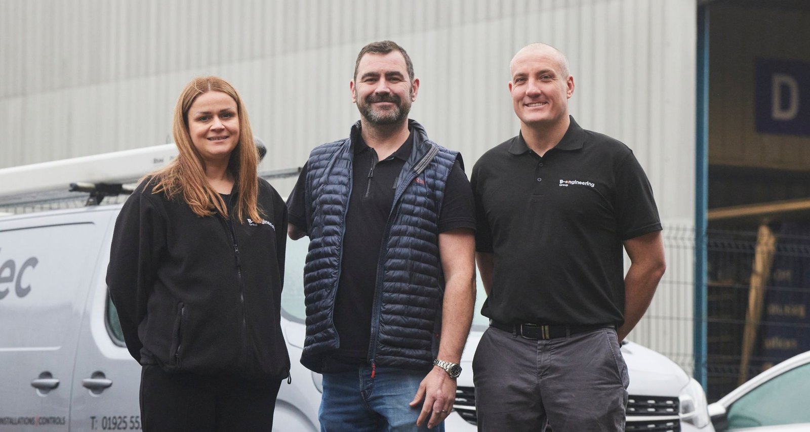 Former Soldier and triple amputee takes photo with B-engineering directors and charity advocates