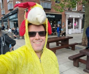 Man dressed as a chicken running a marathon